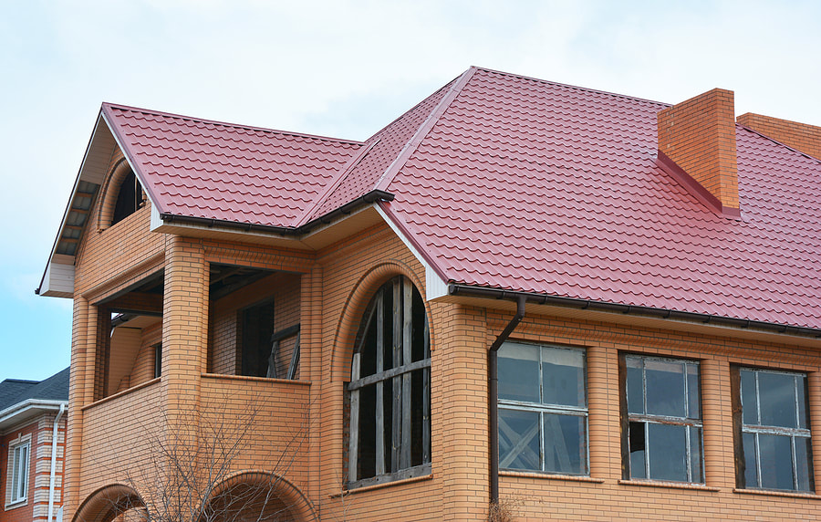 a house with metal roofing